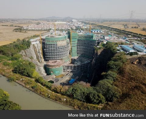 Shanghai luxury hotel being built in an abandoned quarry