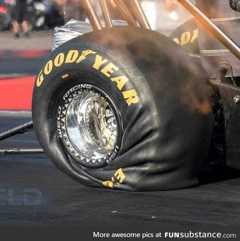 What 10k horsepower on a drag racing tire looks like