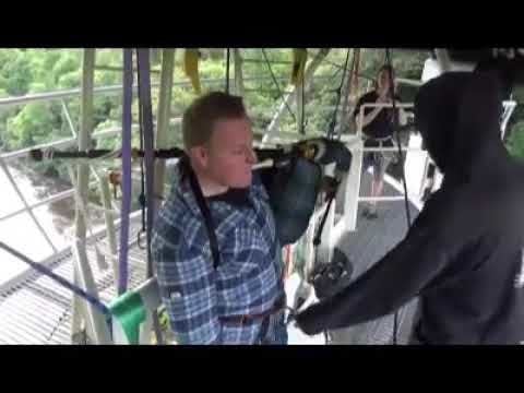 Man plays the bagpipes while bungee jumping