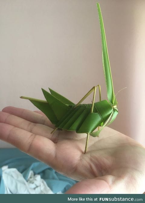 Grasshopper made from one palm leaf