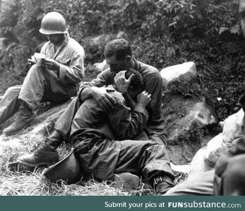 American Soldier Comforting Fellow Soldier Who’s Friend Was KIA - Korean War
