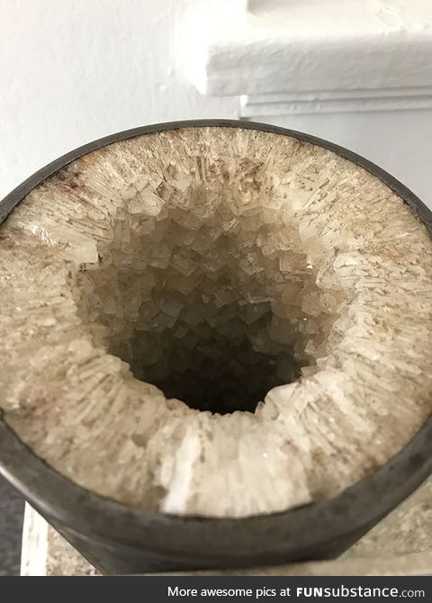 Water pipe encrusted with groundwater salt