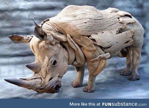 Rhino sculpture made from driftwood
