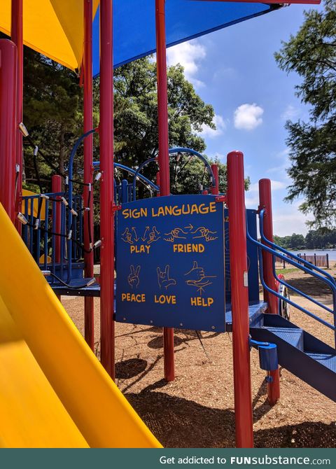 playground has a sign so hearing and deaf kids can play together