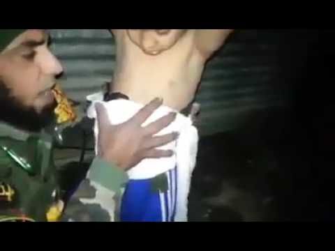 Iraqi soldier removes suicide belt from boy in Mosul (with English subtitles)
