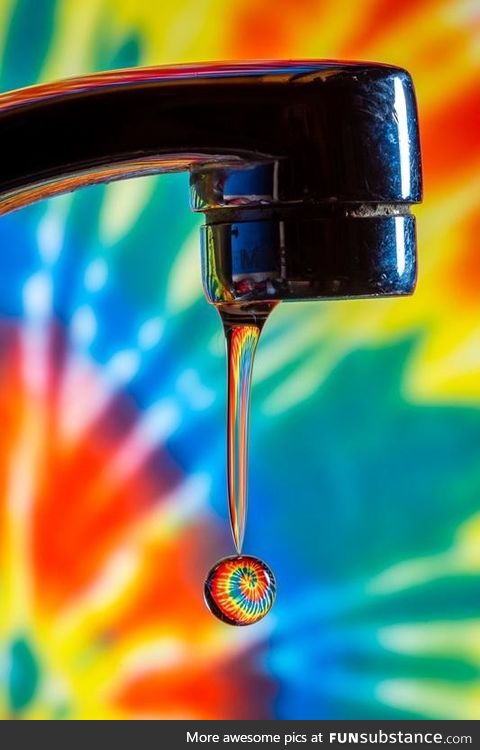 ITAP of a waterdrop refracting light from a tie-dye shirt