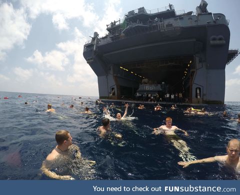Just some sailors and marines enjoying the water on a much needed break