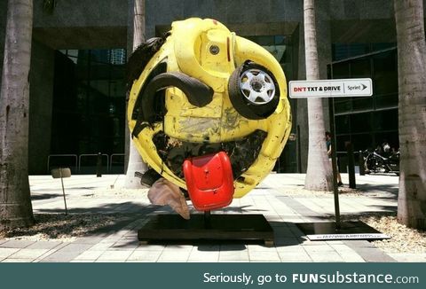 Artist Rudolf John, transformed a mangled car into an emoji as an anti texting