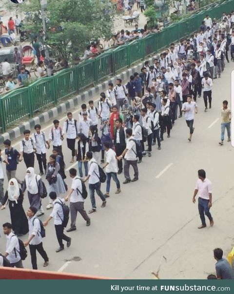 Male students protecting female students in Bangladesh