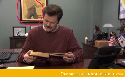 Ron Swanson has a overly manly man picture in his office!!