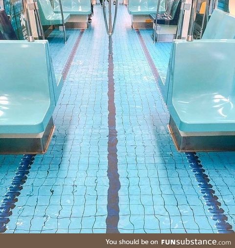 This subway floor made to look like a swimming pool