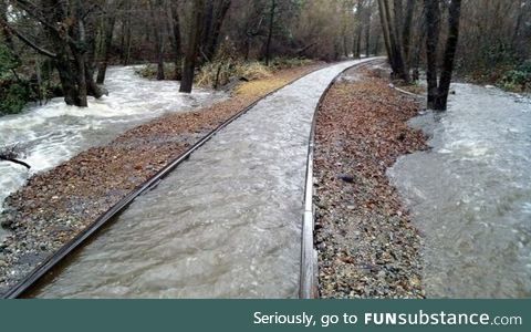 The train tracks won't let the water escape