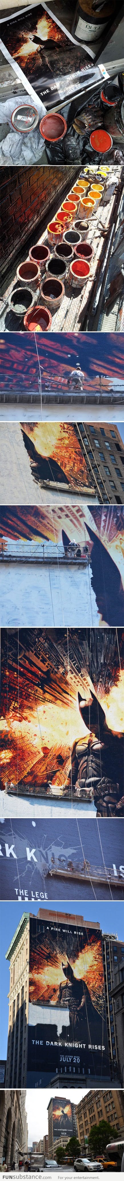 The painting of a 150-foot tall Dark Knight Rises mural