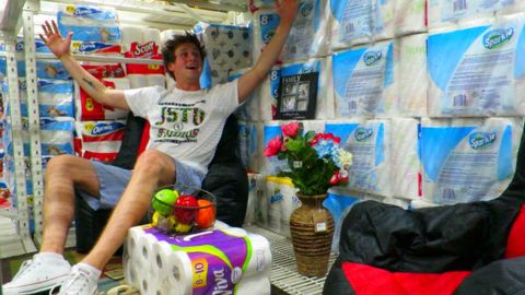 Two guys make full on home renovations inside a Walmart toilet paper aisle