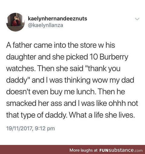 A father and daughter walk into a store