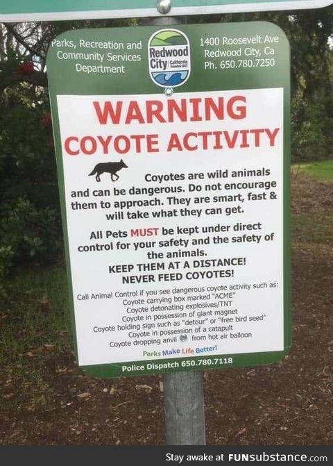 Read the fine print on this coyote warning sign