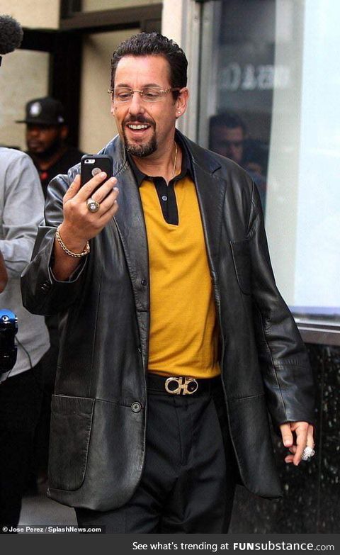 Adam Sandler looks like he owns about 4 strip clubs
