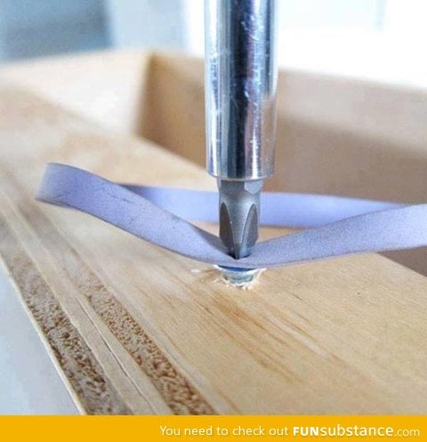 Tip: Use a rubber band to remove a stripped screw