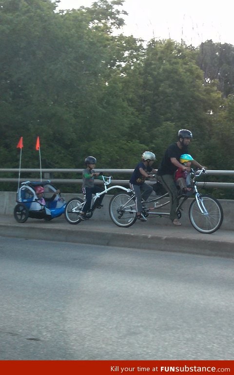 Just an awesome dad guy riding around with his kids