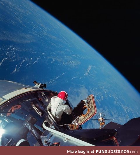 Astronaut Dave Scott looks at Earth from the Apollo 9 Command Module in March, 1969. NASA