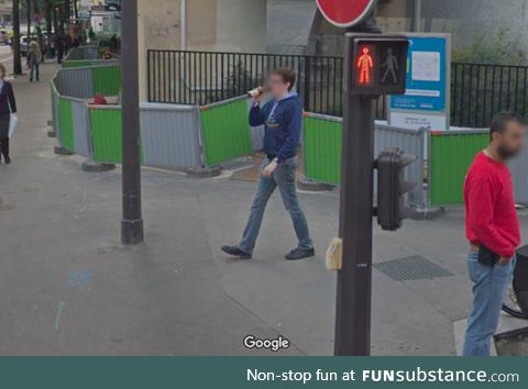 I've been immortalized drinking a beer while walking by a Google Street View Car