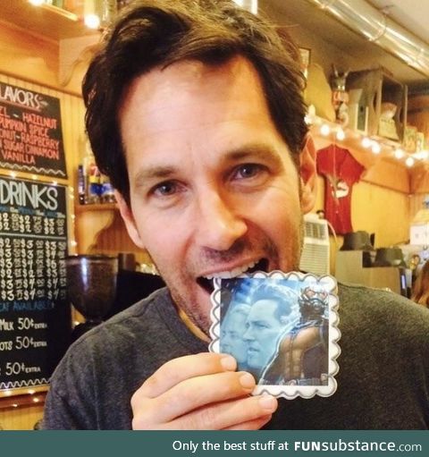 Ant-Man eating an Ant-Man cookie at the Candy Shop he co-owns with Jeffrey Dean Morgan