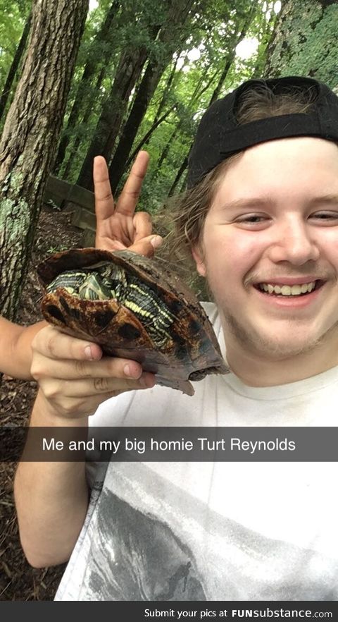 Found a turtle by the parking lot, and put him back near the lake