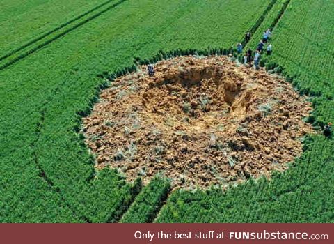 Crater from a 250 kilo WW2 bomb which detonated last weekend in a farmer's field in