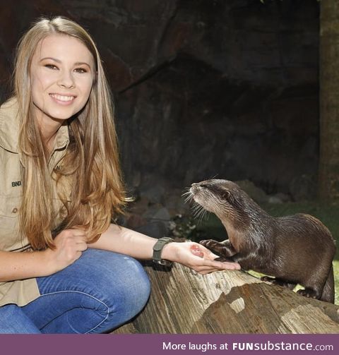 Here's Bindi Irwin with an otter