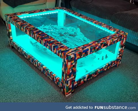This guy made a coffee table for his Lego millennium falcon