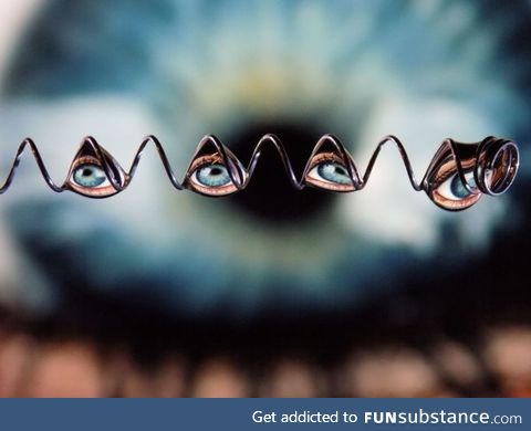 Photographer Rachael B placed some water drops onto a metal spring and captured the