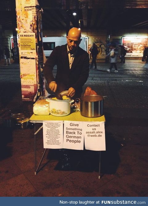 Alex Assali, a Syrian refugee cooks food in the street for the homeless in Germany