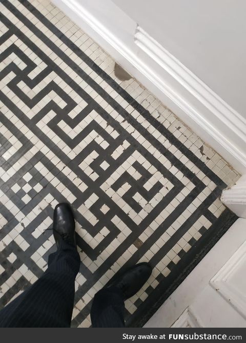 This pattern on the floor gets cut off because of the corner piece