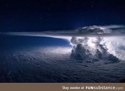 This picture of a thunderstorm at night over the Pacific ocean was taken at 37,000 feet