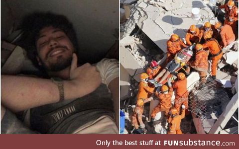 A building collapsed and this guy took a selfie under the wreckage to calm down his family