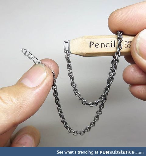 It's just chain link carved from pencil lead. NBD
