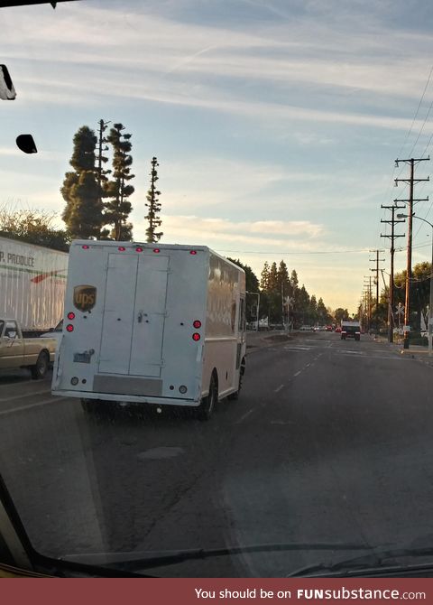A rare albino UPS truck out in the wild