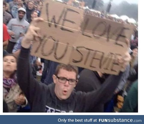 Never forget the guy who brought a sign to a Stevie Wonder concert