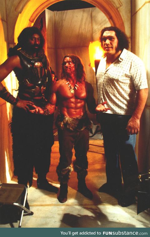 Arnold Schwarzenegger next to Wilt Chamberlain and Andre the Giant