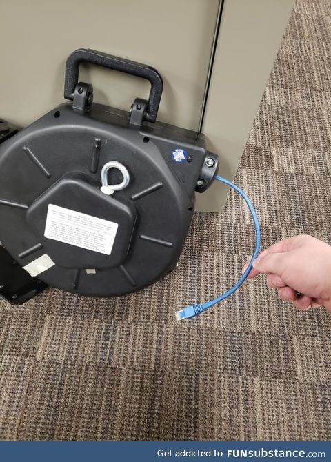 One of the madlad electricians at work made a 150 foot retractable ethernet cable