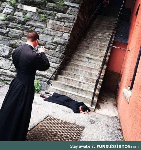 Ordained Exorcists snapping photos at The Exorcist steps