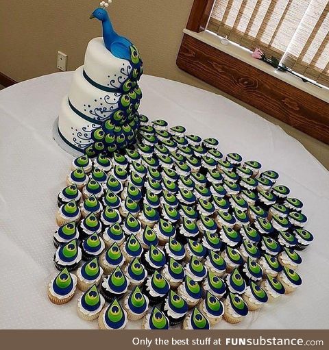 Peacock cake and cup cakes