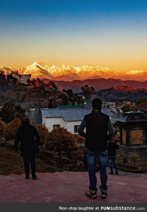 Golden Himalayan mountain range at sunrise