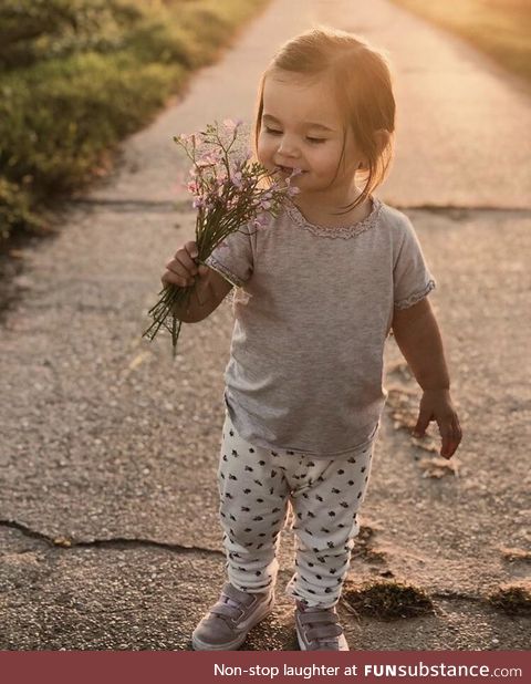 Meet Mayla, she loves smelling flowers. I‘m one proud godfather