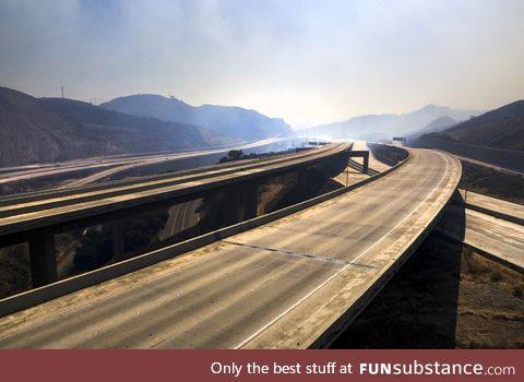 Eerie photo of empty Los Angeles freeways today due to the ongoing Saddleridge fires