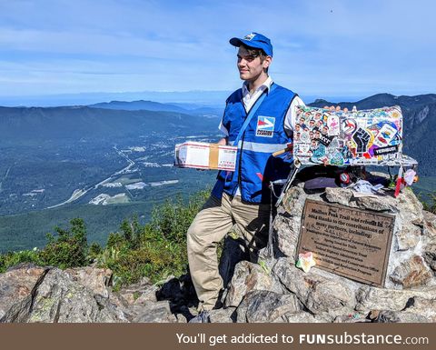 My son dressed up as a mailman and hiked 8 miles just to take this picture at Mailbox Peak