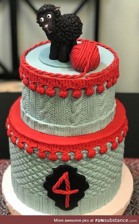 This is a CAKE! My wife made this by molding fondant to a knit pattern for the 4-year