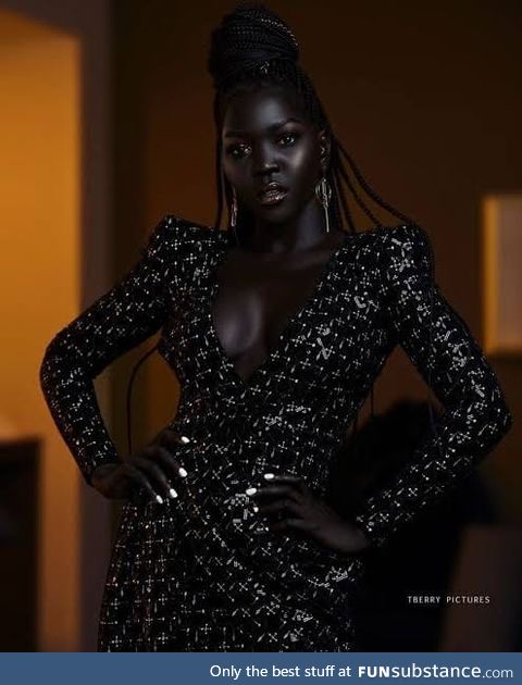 Nyakim Gatwech model with the darkest skin in the world. Just stunning!!!