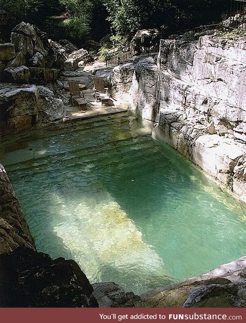 Swimming pool carved of stone