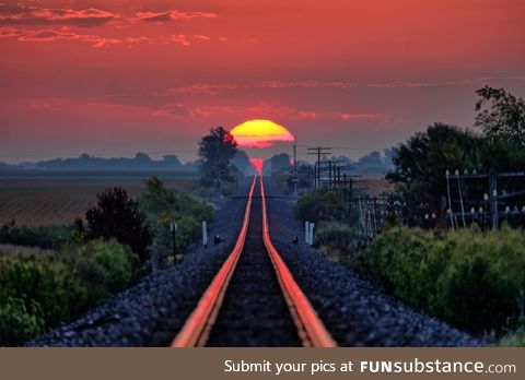 The sun rises just right and reflects along the railroad tracks. Photo by Raymond